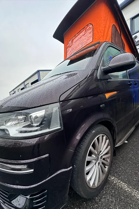 Beige canvas pop top roof on a VW T5