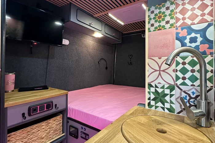 Kitchen area and bed